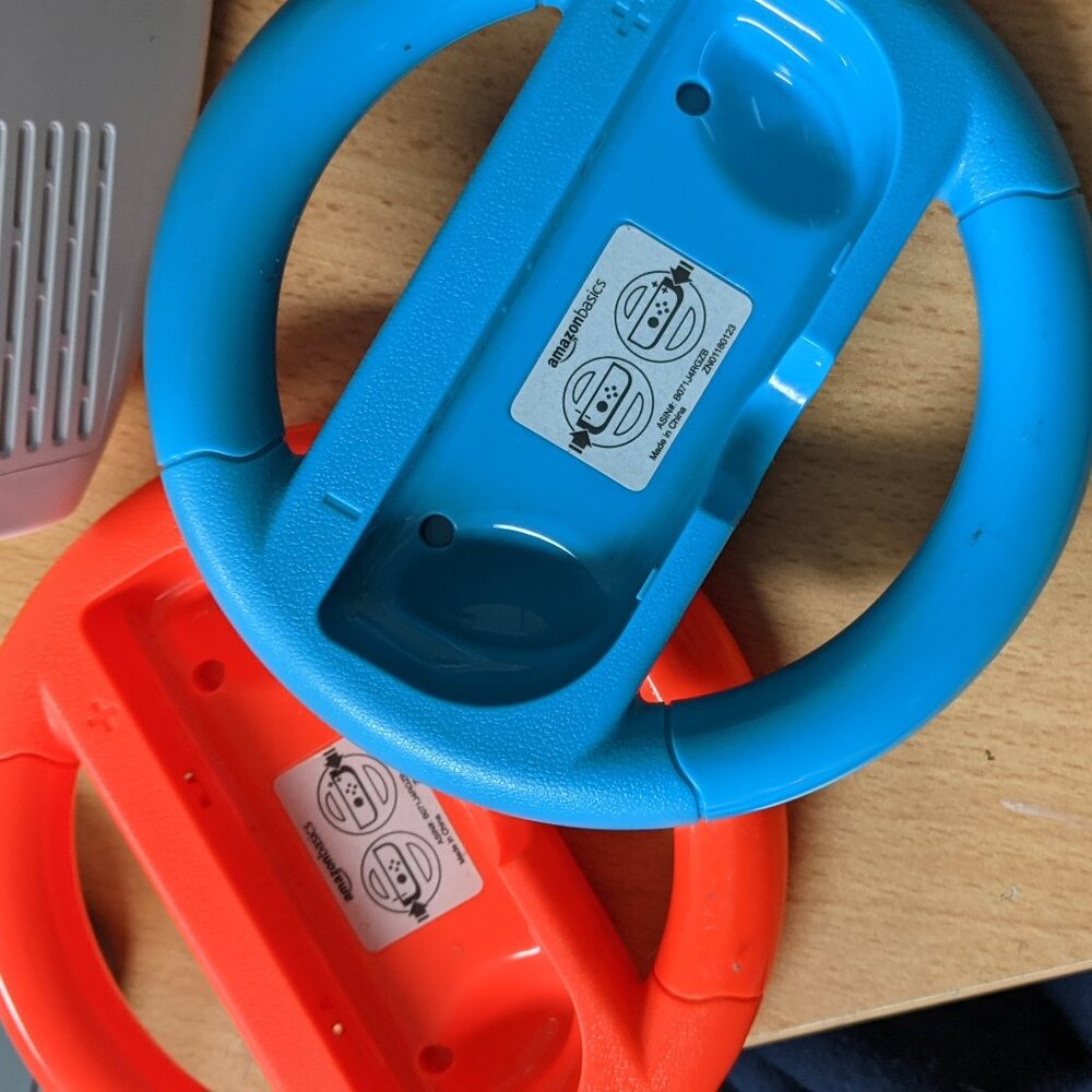 Nintendo Switch Mario cart controllers.